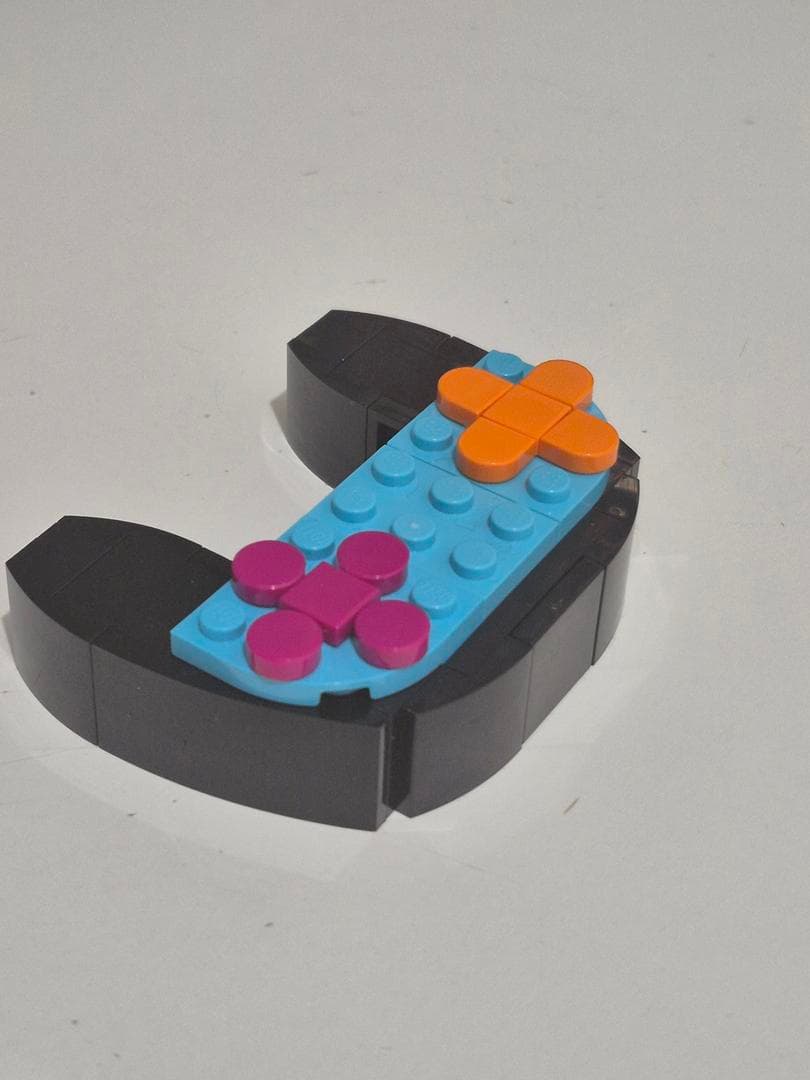 LEGO sættet Le Grand Turnoi des Champs 2025 - Mini Manette